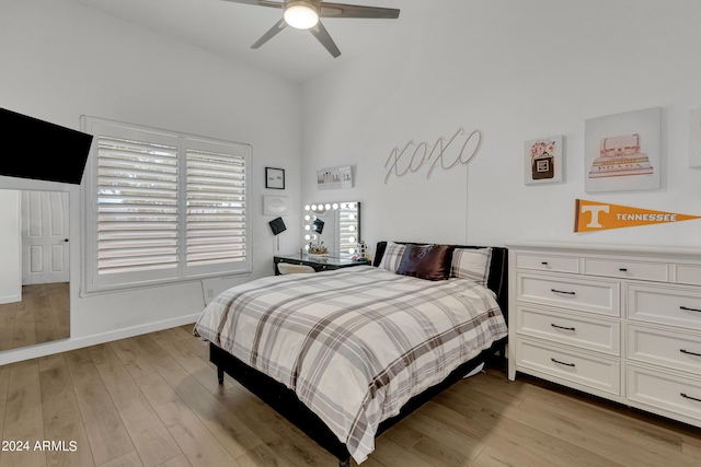 bedroom featuring light hardwood / wood-style flooring and ceiling fan