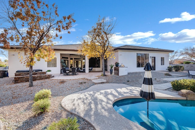 rear view of house featuring a patio area