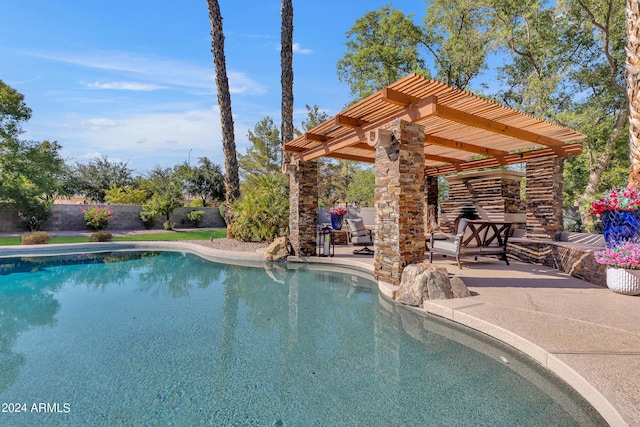 view of pool featuring a patio area and a pergola