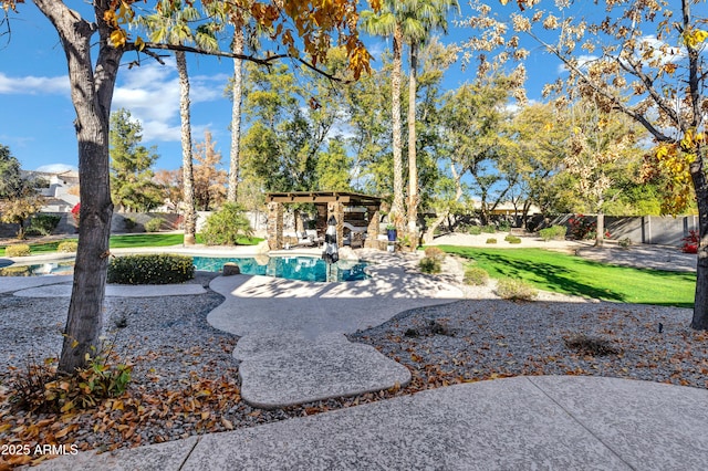 exterior space featuring a patio and a lawn