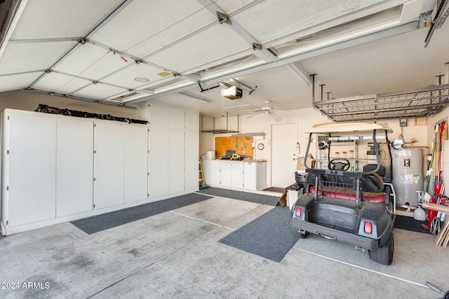 garage featuring electric water heater, ceiling fan, and a garage door opener