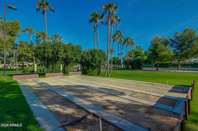 view of home's community with a lawn