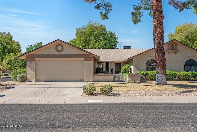 single story home with a garage