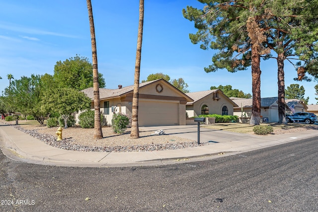 single story home featuring a garage