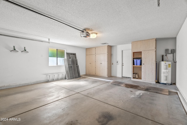 garage with water heater and a garage door opener