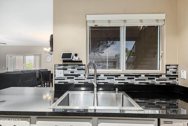 kitchen with sink and decorative backsplash