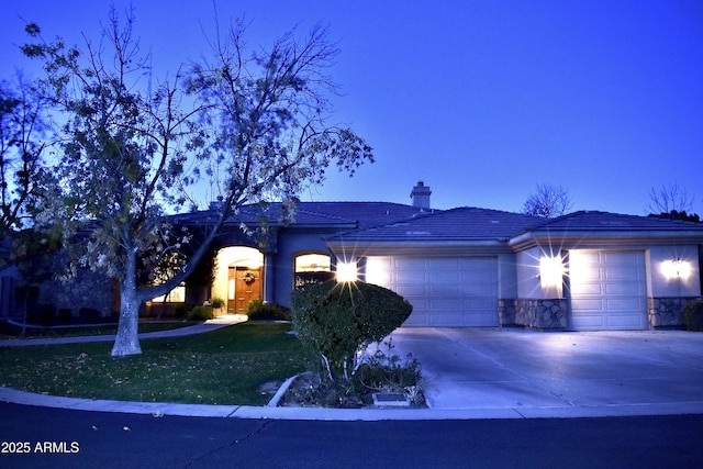 ranch-style home with a garage