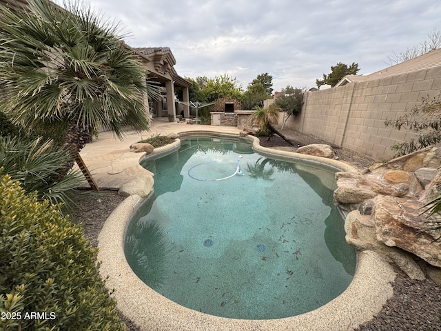 view of pool with a patio area