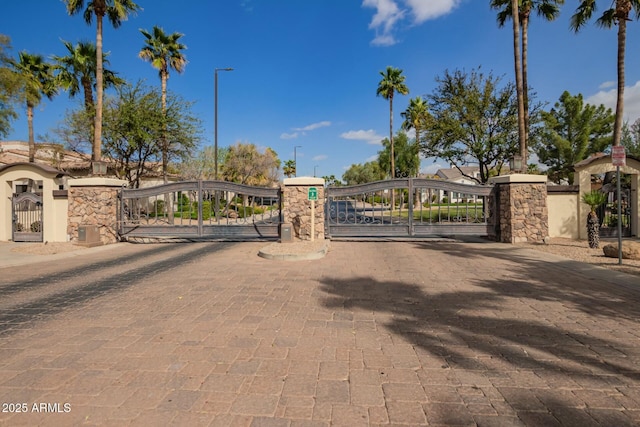 view of gate featuring central AC unit