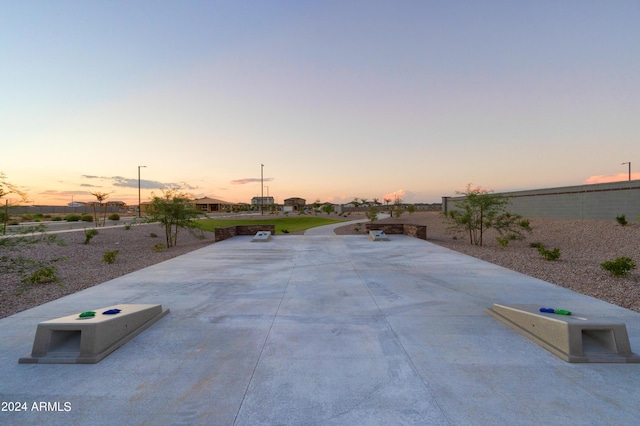 view of patio terrace at dusk