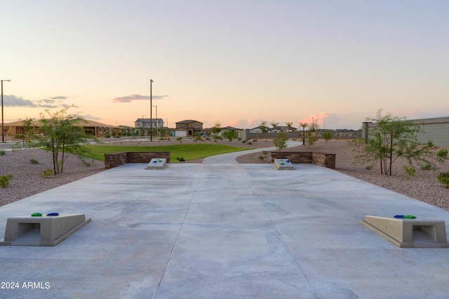 view of patio terrace at dusk