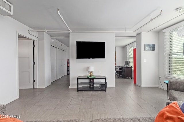 living room with a healthy amount of sunlight