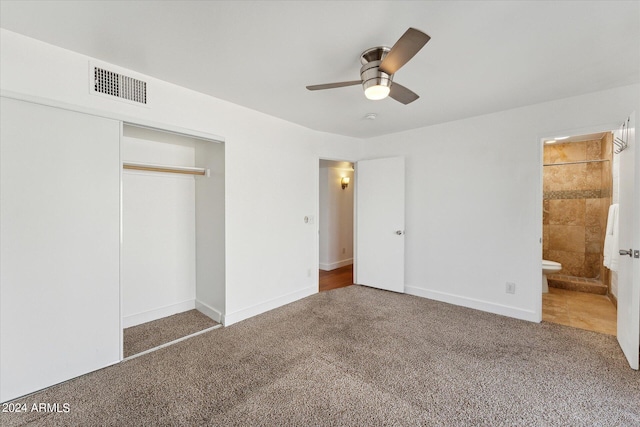 unfurnished bedroom featuring carpet, ceiling fan, and a closet