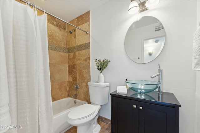 full bathroom featuring shower / bath combination with curtain, vanity, and toilet