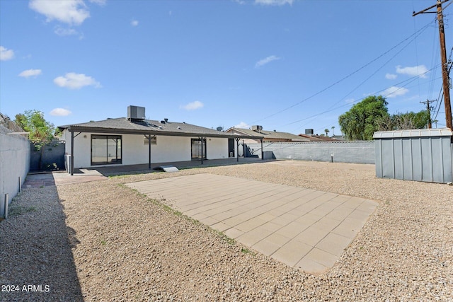 back of house featuring a patio area