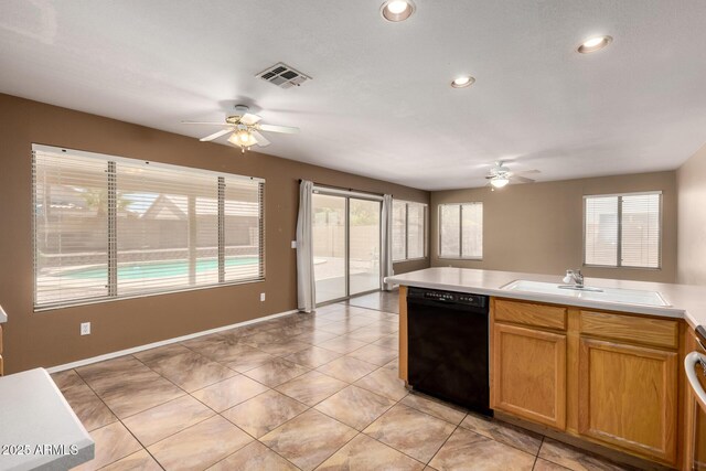 1403 W Goldfinch Way, Chandler, AZ 85286 - kitchen featuring ceiling fan, black dishwasher, plenty of natural light, and recessed lighting