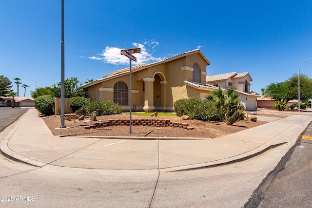 1403 W Goldfinch Way, Chandler, AZ 85286 - mediterranean / spanish-style house with stucco siding and a tiled roof