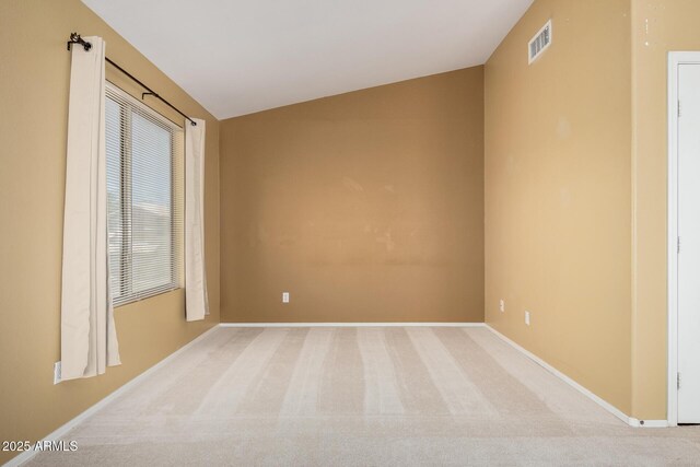 1403 W Goldfinch Way, Chandler, AZ 85286 - carpeted empty room featuring vaulted ceiling and baseboards