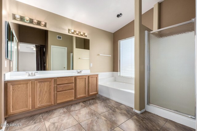 1403 W Goldfinch Way, Chandler, AZ 85286 - bathroom featuring vaulted ceiling, a bath, a shower stall, and double vanity