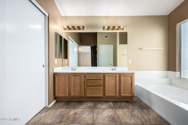 1403 W Goldfinch Way, Chandler, AZ 85286 - full bathroom featuring double vanity and a garden tub