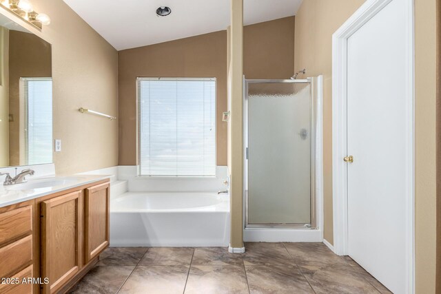 1403 W Goldfinch Way, Chandler, AZ 85286 - bathroom with a stall shower, vanity, a garden tub, and vaulted ceiling