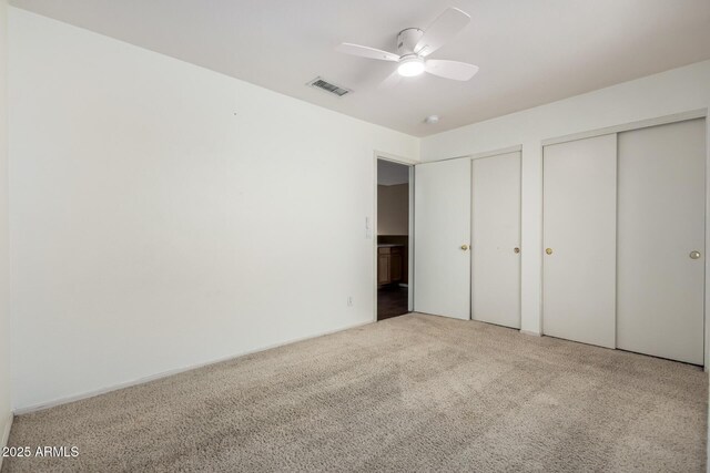 1403 W Goldfinch Way, Chandler, AZ 85286 - unfurnished bedroom with multiple closets and carpet flooring