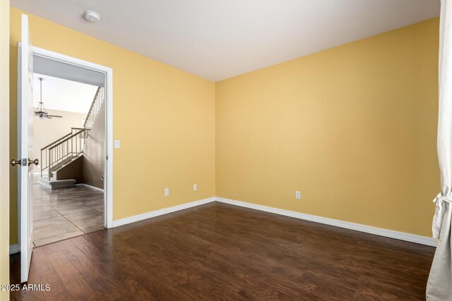 1403 W Goldfinch Way, Chandler, AZ 85286 - empty room with dark wood-style flooring, stairs, and a smoke detector