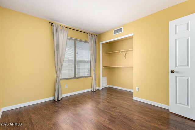 1403 W Goldfinch Way, Chandler, AZ 85286 - unfurnished bedroom featuring wood finished floors and a closet