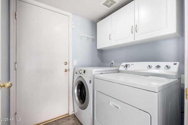 1403 W Goldfinch Way, Chandler, AZ 85286 - washroom featuring washer and clothes dryer, cabinet space, and tile patterned floors