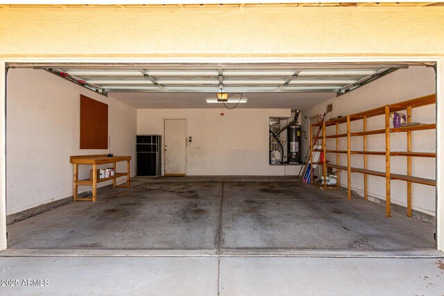 1403 W Goldfinch Way, Chandler, AZ 85286 - garage with strapped water heater and a garage door opener