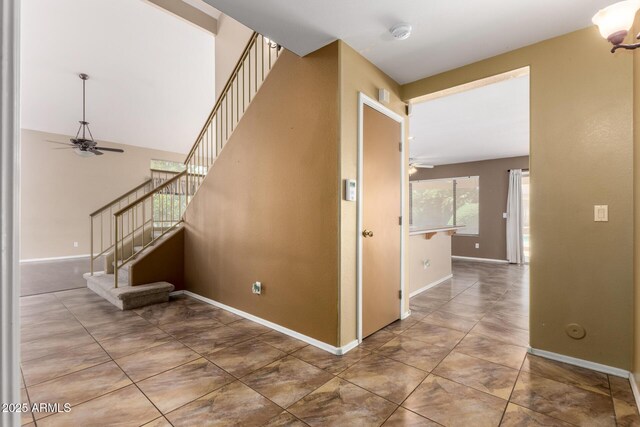 1403 W Goldfinch Way, Chandler, AZ 85286 - stairway featuring ceiling fan and tile patterned flooring
