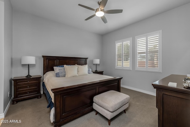 bedroom with ceiling fan and light colored carpet