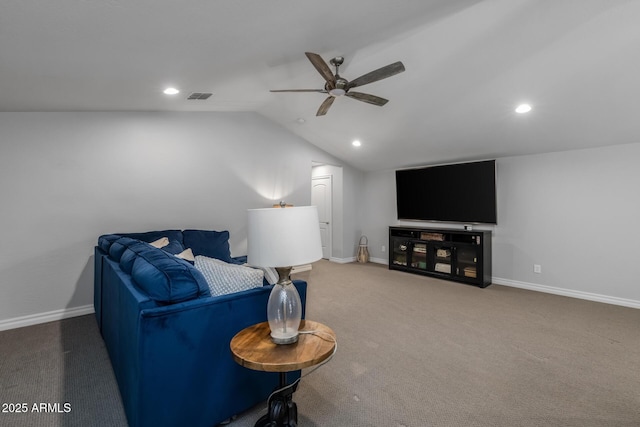 carpeted living room featuring ceiling fan and lofted ceiling