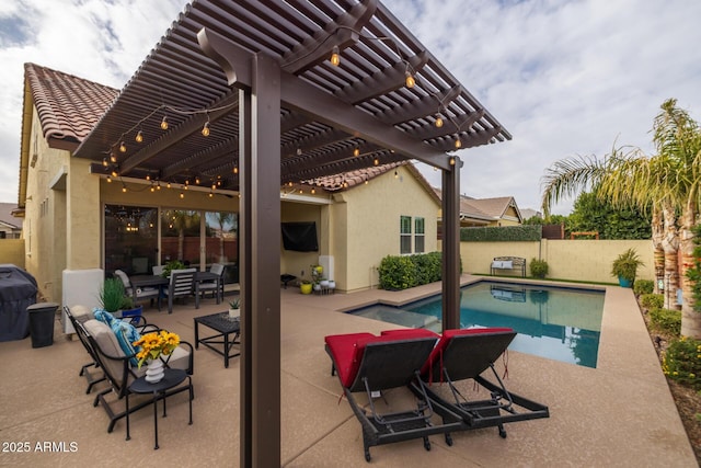 view of swimming pool with outdoor lounge area, a pergola, grilling area, and a patio area