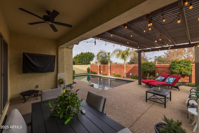 view of patio / terrace featuring ceiling fan, a fenced in pool, a pergola, and an outdoor hangout area