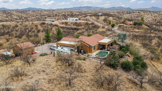 aerial view featuring a mountain view