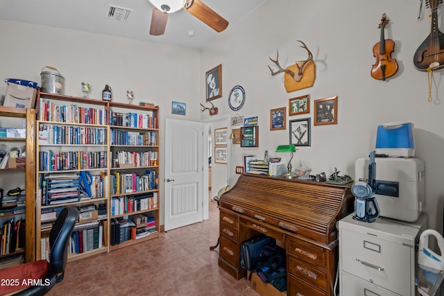 tiled office with visible vents and ceiling fan