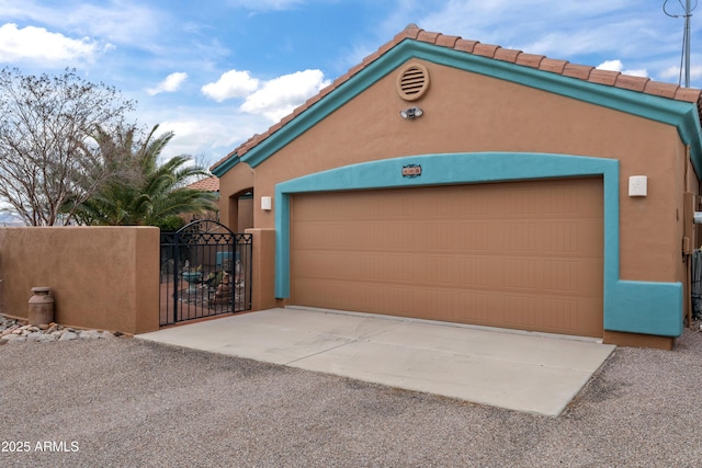 garage featuring a gate