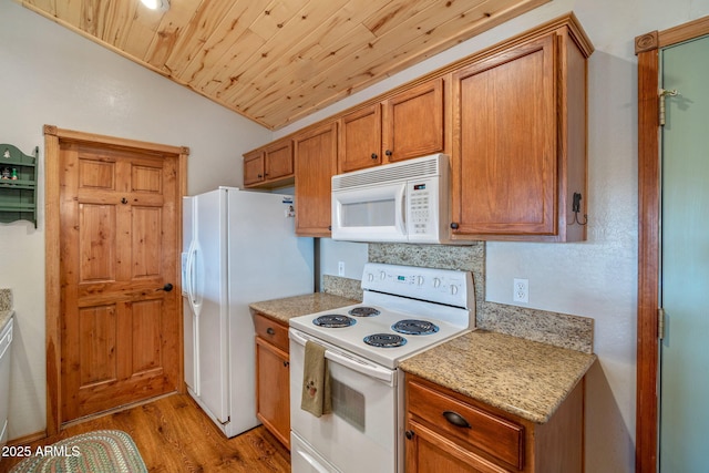 kitchen featuring vaulted ceiling, backsplash, wooden ceiling, white appliances, and light hardwood / wood-style flooring