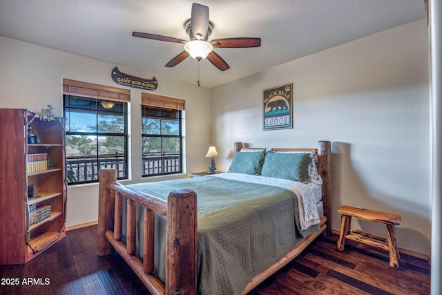 bedroom featuring dark wood-type flooring and ceiling fan