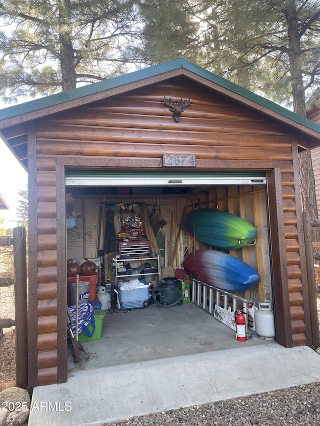 view of outdoor structure with a garage