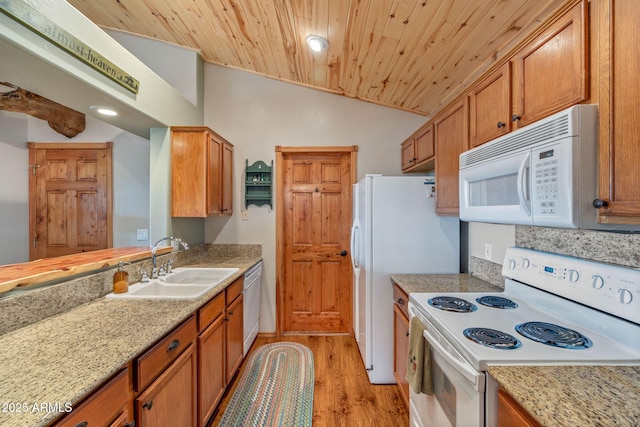 kitchen with sink, wood ceiling, vaulted ceiling, white appliances, and light hardwood / wood-style floors