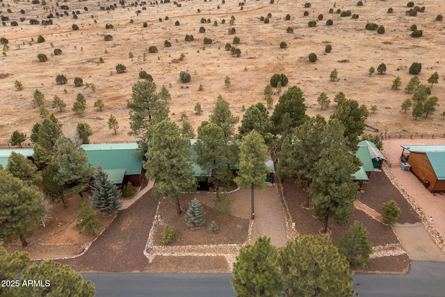 birds eye view of property featuring a rural view