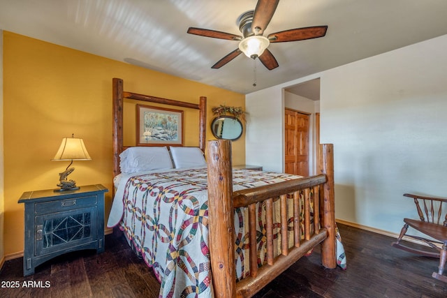 bedroom featuring a closet, dark hardwood / wood-style floors, and ceiling fan