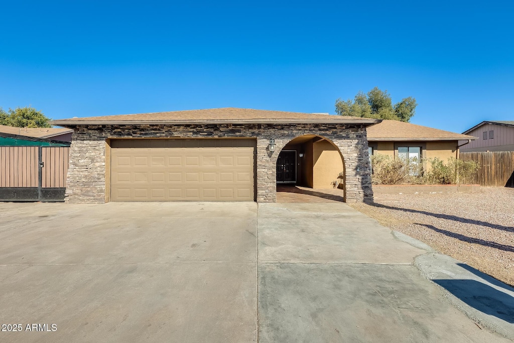 view of front of property with a garage