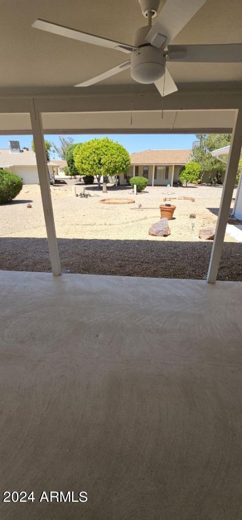 view of patio with ceiling fan