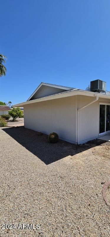 view of side of property featuring cooling unit