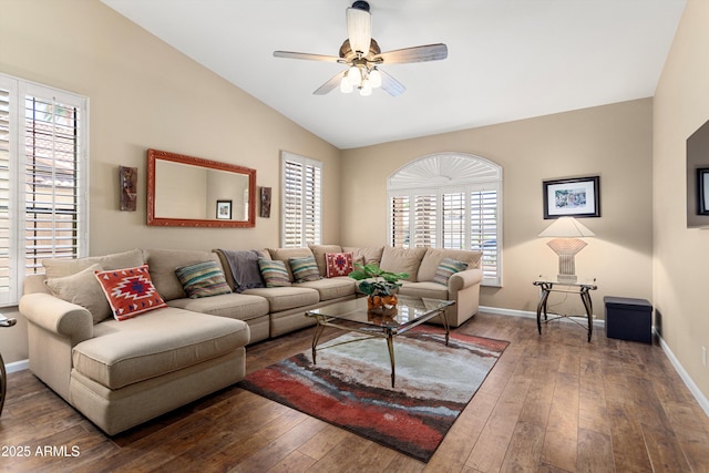 3797 N 156th Dr N, Goodyear, AZ 85395 - living room with a ceiling fan, vaulted ceiling, a healthy amount of sunlight, and hardwood / wood-style floors
