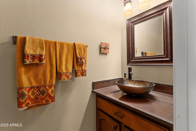 3797 N 156th Dr N, Goodyear, AZ 85395 - bathroom with vanity and a textured wall