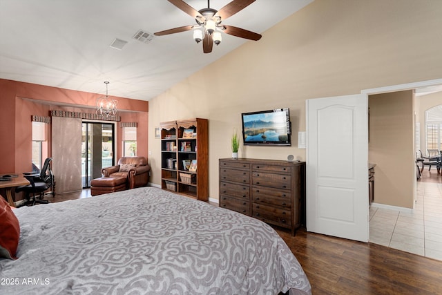 3797 N 156th Dr N, Goodyear, AZ 85395 - bedroom featuring visible vents, wood finished floors, a chandelier, and multiple windows